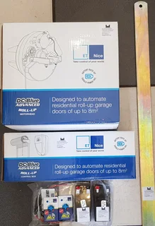 Roll Up Garage Door Motor Kit New Complete Batteries Remotes