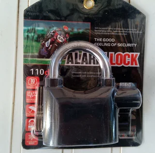 Alarm Security Lock with  movement and shock sensor, activates 110 Db alarm siren!