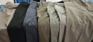 Seven pairs of Woolworths trousers size 46-117cm inside leg 84 cm.