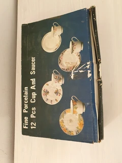 Fine Porcelain 12 Pcs Cup And Saucer Set With Extras