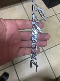 Belmont Chev badge cast metal emblem.