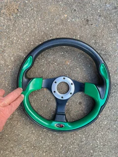 VW Steering wheel sport green & black Toyota.