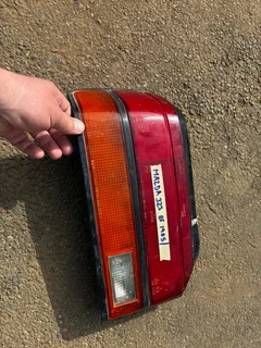 Mazda 323 Taillight Tail Light lamp Left.