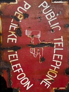 Enamel public telephone metal sign.