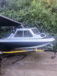 60hp Mariner 3 cylinder big foot and boat