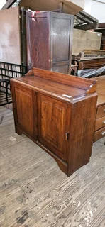 Rhodesian Teak Sliding Door Credenza
