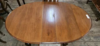 Teak Extending Dining Table