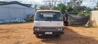 NISSAN UD40 CABSTAR WITH DROPSIDE BODY