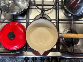 Sauce pan eetrite cast iron enamel 18 5cm diameter x9cm deep in red with wood handle &amp; spout