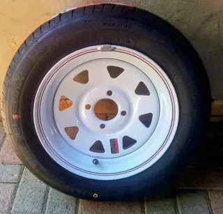 Convert 10" Venter trailer wheels to 13" white steel rims with 155/70r13 tyres.