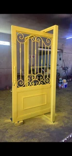 Wrought iron glass door with opening windows