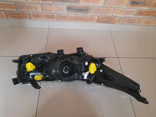 TOYOTA COROLLA PRESTIGE 14 ON BRAND NEW HEADLIGHTS FORSALE PRICE R2350 EACH