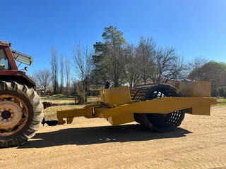 Tow Behind Grid Roller