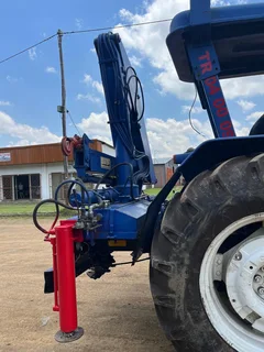 New Holland 6610 Tractor with Spartan Crane
