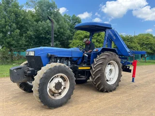 New Holland 6610 Tractor with Spartan Crane