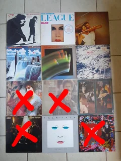 Assorted popular 70s, 80s vinyl records for sale