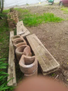 Retaining blocks and precast slabs