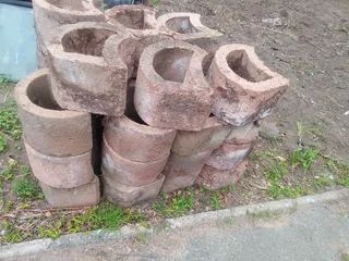 Retaining blocks and precast slabs