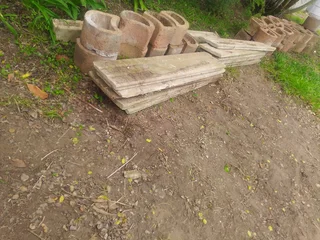 Retaining blocks and precast slabs