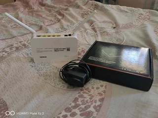 FIBRE ROUTER AND MINI BACKUP UPS