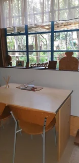 Quaint, furnished two-bedroom garden cottage in Chartwell North