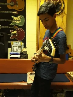 GUITAR LESSONS- UKULELE LESSONS