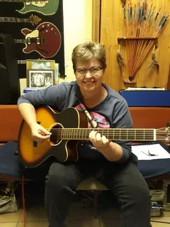 Guitar lessons, Ukulele lessons, Djembe drumming lessons