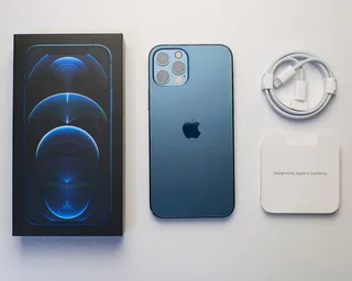 256GB APPLE IPHONE 12 PRO BLUE IN EXCELLENT CONDITION IN THE BOX WITH ALL ACCESSORIES AND WARRANTY