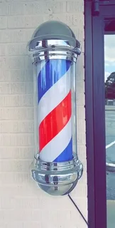 Rotating barber sign pole
