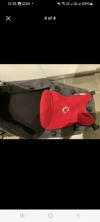 Bassinet and rain cover for the Bugaboo Chameleon pram all as new never used.