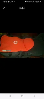 Bassinet and rain cover for the Bugaboo Chameleon pram all as new never used.