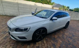 2014 White Volvo V60 D5 R design 2.4 D 5-cylinder twin-scroll turbo diesel station wagon automatic