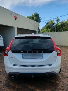 2014 White Volvo V60 D5 R design 2.4 D 5-cylinder twin-scroll turbo diesel station wagon automatic