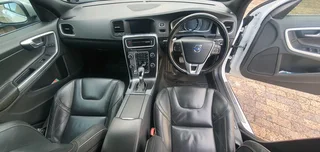 2014 White Volvo V60 D5 R design 2.4 D 5-cylinder twin-scroll turbo diesel station wagon automatic