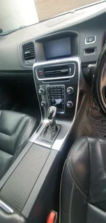 2014 White Volvo V60 D5 R design 2.4 D 5-cylinder twin-scroll turbo diesel station wagon automatic