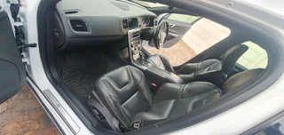 2014 White Volvo V60 D5 R design 2.4 D 5-cylinder twin-scroll turbo diesel station wagon automatic