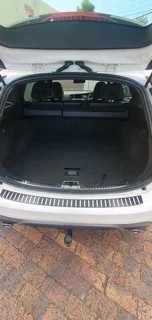 2014 White Volvo V60 D5 R design 2.4 D 5-cylinder twin-scroll turbo diesel station wagon automatic