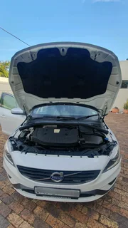 2014 White Volvo V60 D5 R design 2.4 D 5-cylinder twin-scroll turbo diesel station wagon automatic