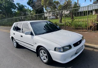 White 2005 Toyota Tazz 1.3 carb  XE aircon spec hatch back in excellent clean cond 2nd owner