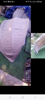 Boat Awning that folds up - various Uses.It has a metal frame with gas struts. Size: 1m high x 1m de