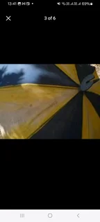 collectable vintage umbrella with fold out shooting stick seat  in fair condition