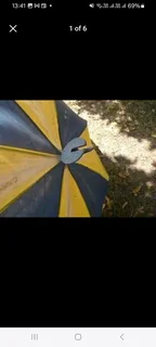 collectable vintage umbrella with fold out shooting stick seat  in fair condition