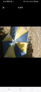 collectable vintage umbrella with fold out shooting stick seat  in fair condition