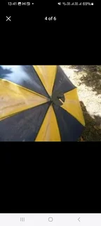 collectable vintage umbrella with fold out shooting stick seat  in fair condition