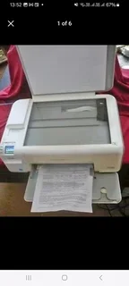 Hp c4880 photsmart printer scanner copier in full working order with some inkink left.PLUS new inks