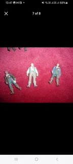 Vintage metal pirate figurines and associated maritime pieces such as treasure chests canons etc