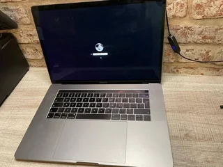 Apple 16-inch True Tone Touchbar Retina MacBook Pro Intel 8-Core i9 16GB ram 1TB SSD for sale
