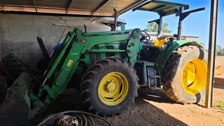 John Deer 6430 met laaigraaf