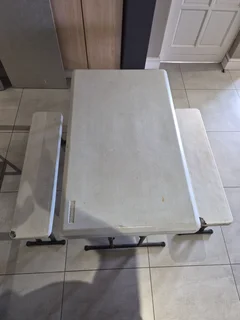CAMPING FOLDING  PICNIC TABLE WITH CHAIRS LITTLE DAMAGE ON CORNER CHAIR HENCE CHEAP PRICE  COLLECT!