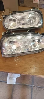 GOLF 4 TO FIT GOLF 3 HEAD LAMP R 999.00 ((PAIR))- NEW
